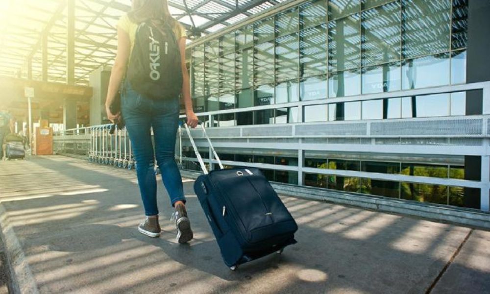 Solo female traveler at the airport